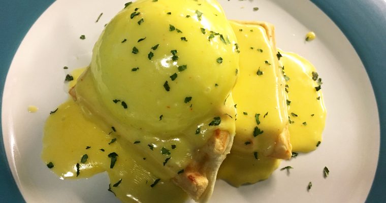 Eggs Benedict over Savory Herb and Cheese Waffles