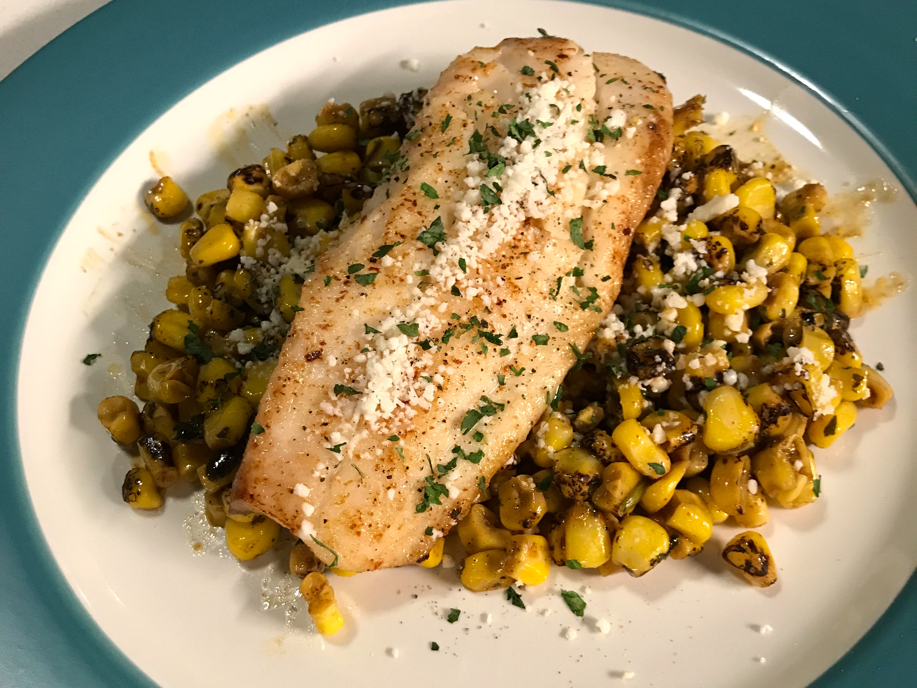 Buttery Tilapia over Elote